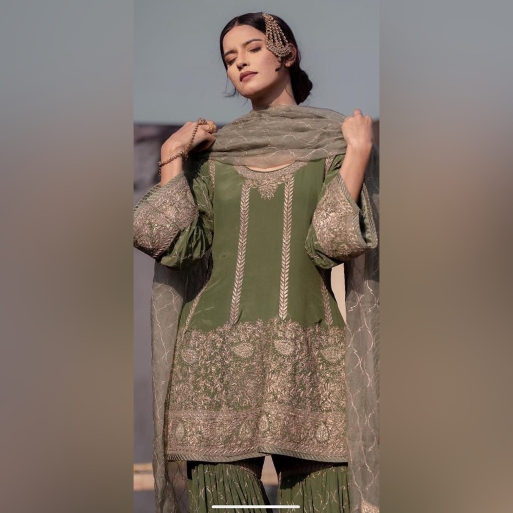 Olive sharara with Jaal dupatta Pakistani outfit.